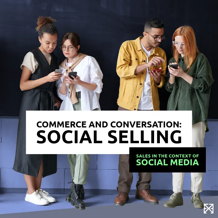Thumbnail Social Selling: A diverse group of young adults standing in front of a blackboard, jointly focused on their smartphones.