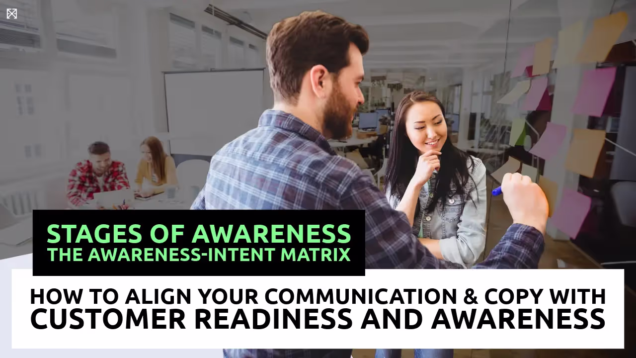 copywriters and marketers discussing awareness-level stages